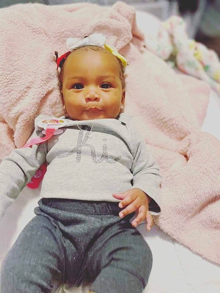 Ledarriona is registered to the contest to win money with this photo: baby, baby_products, baby_toddler_clothing, cap, cheek, child, comfort, eye, face, facial_expression, happy, lip, person, pink, sitting, skin, sleeve, smile, standing, toddler