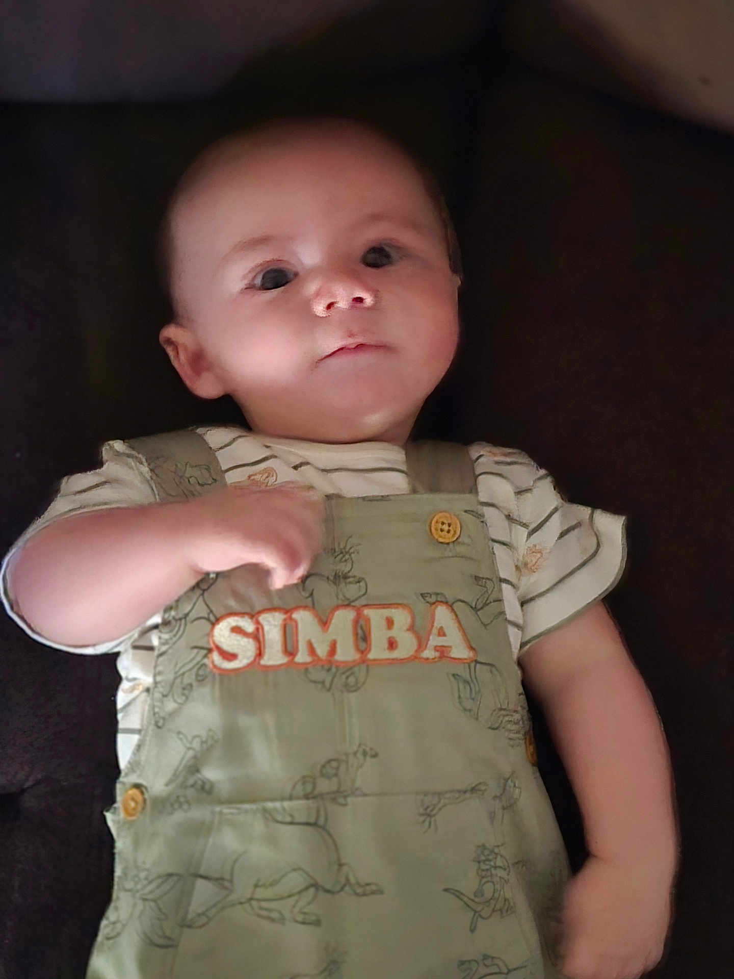 Cole joined the competition — help win amazing prizes! baby, infant, child, overalls, clothing, simba, cute, portrait, face, expression, lying_down, hand, arm, button, striped_shirt, young, skin, head, eyes, indoors