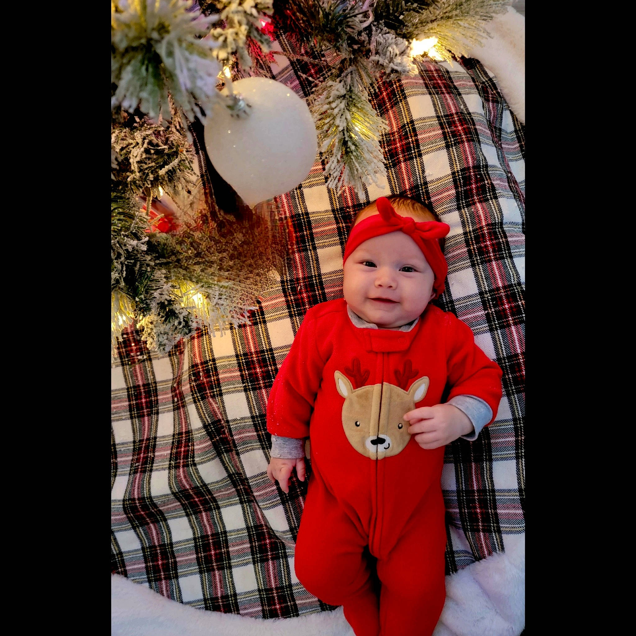 Alayah joined the competition — help win amazing prizes! baby, baby_toddler_clothing, christmas, christmas_decoration, christmas_eve, christmas_ornament, event, happy, headwear, holiday, human_body, joy, lap, outerwear, pattern, person, plaid, red, sleeve, tartan