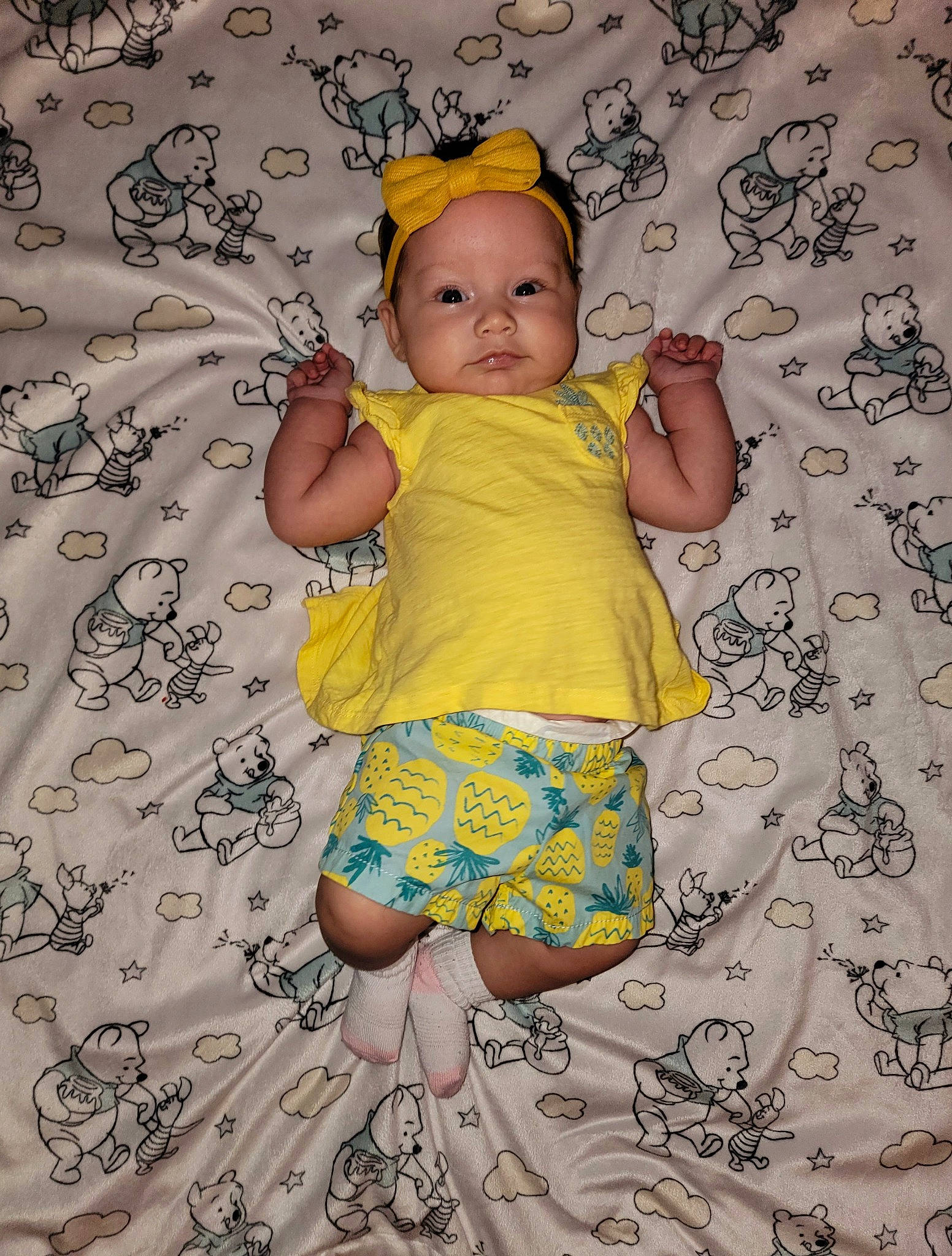 Alayah is registered to the contest to win money with this photo: arm, baby, baby_toddler_clothing, child, day_dress, facial_expression, fun, happy, headwear, linens, pattern, people_in_nature, person, play, room, skin, sleeve, t_shirt, textile, toddler