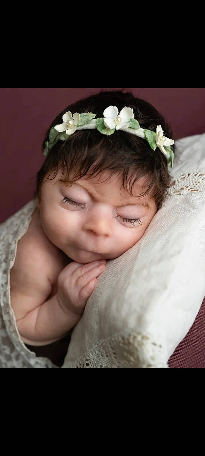 Mylie is registered to the contest to win money with this photo: arm, dress, eye, eyebrow, face, facial_expression, finger, flash_photography, hair, hairstyle, hand, happy, head, human, iris, person, petal, pink, plant, skin