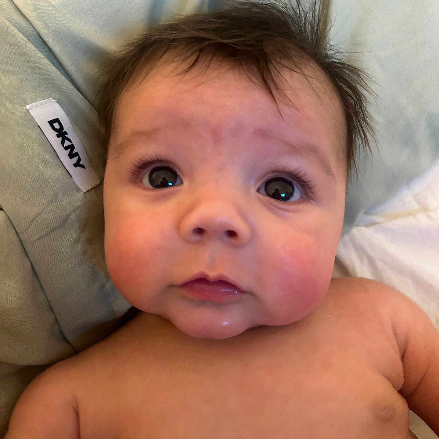 Adrian is registered to the contest to win money with this photo: architecture, baby, bodypart, building, cushion, face, finger, frown, hand, happy, head, homedecor, hospital, mouth, newborn, person, photography, portrait, sad, smile