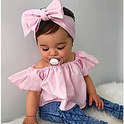 Alicia participe au concours pour gagner de l'argent avec cette photo : toddler, child, baby, pink_clothing, headband, bow, pacifier, jeans, sitting, long_eyelashes, soft_fur, indoor, cute, portrait, casual, fashion, childhood, adorable, looking_down, peaceful