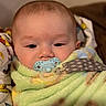 Jason joined the competition — help win amazing prizes! baby, pacifier, blanket, fuzzy, cozy, infant, child, face, closeup, comfort, soft, wrapped, indoor, sleepy, cute, calm, person, portrait, young, resting