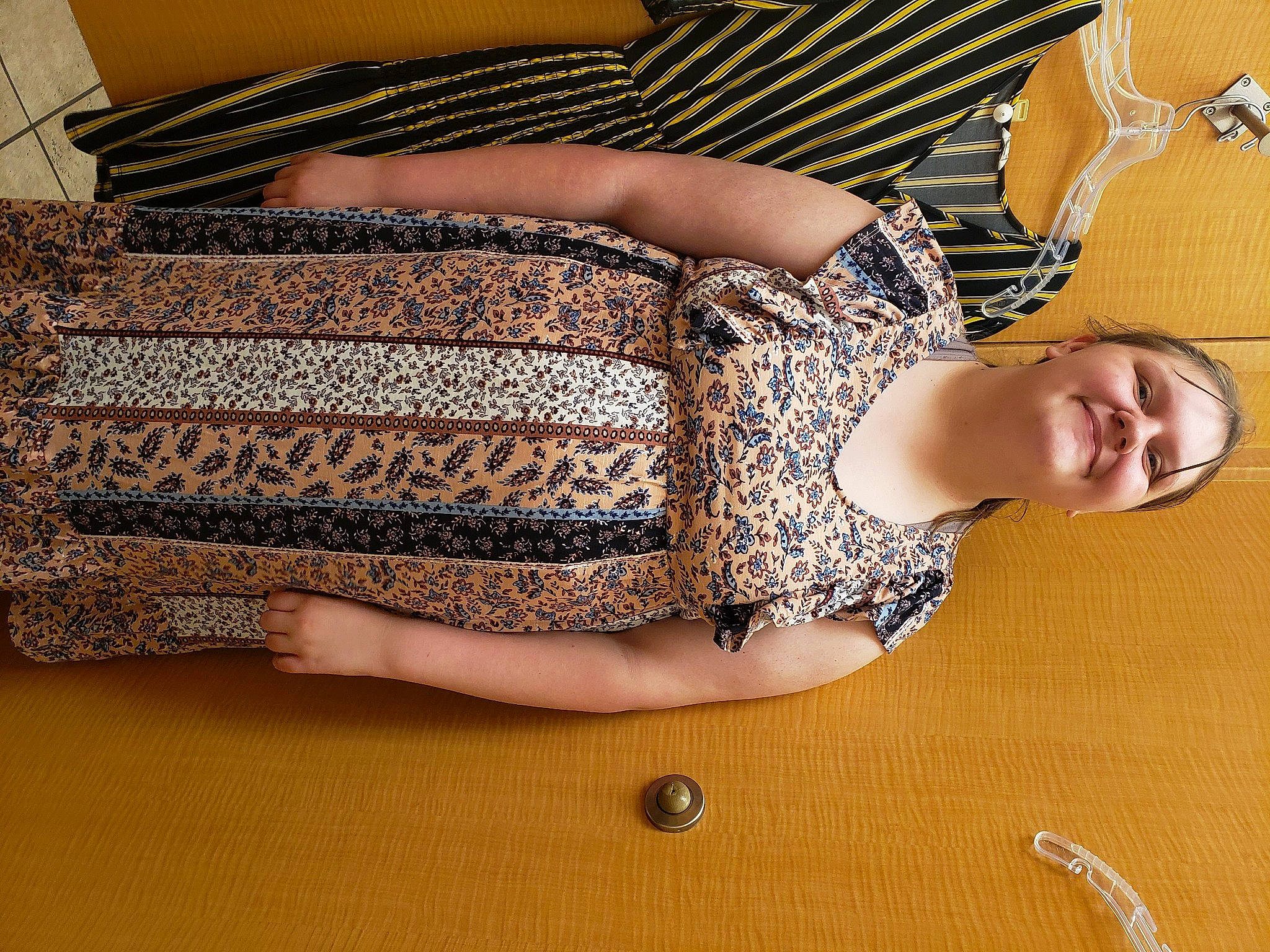 Heaven is registered to the contest to win money with this photo: abdomen, comfort, elbow, floor, flooring, hardwood, human_body, human_leg, joint, joy, knee, leg, long_hair, neck, pattern, person, sleeve, thigh, trunk, waist