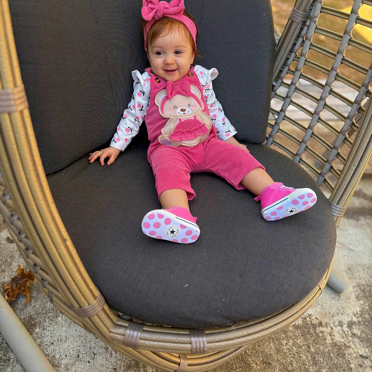 Karol joined the competition — help win amazing prizes! baby, casual, child, concrete, cushion, feet, girl, happy, headband, leaves, outdoor, pink_outfit, playful, portrait, seated, shoes, smiling, sunlight, wicker_chair, young