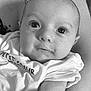 baby, infant, face, eyes, arm, clothing, shirt, person, portrait, black_and_white, closeup, skin, expression, newborn, cute, child, human, baby_girl, baby_boy, young