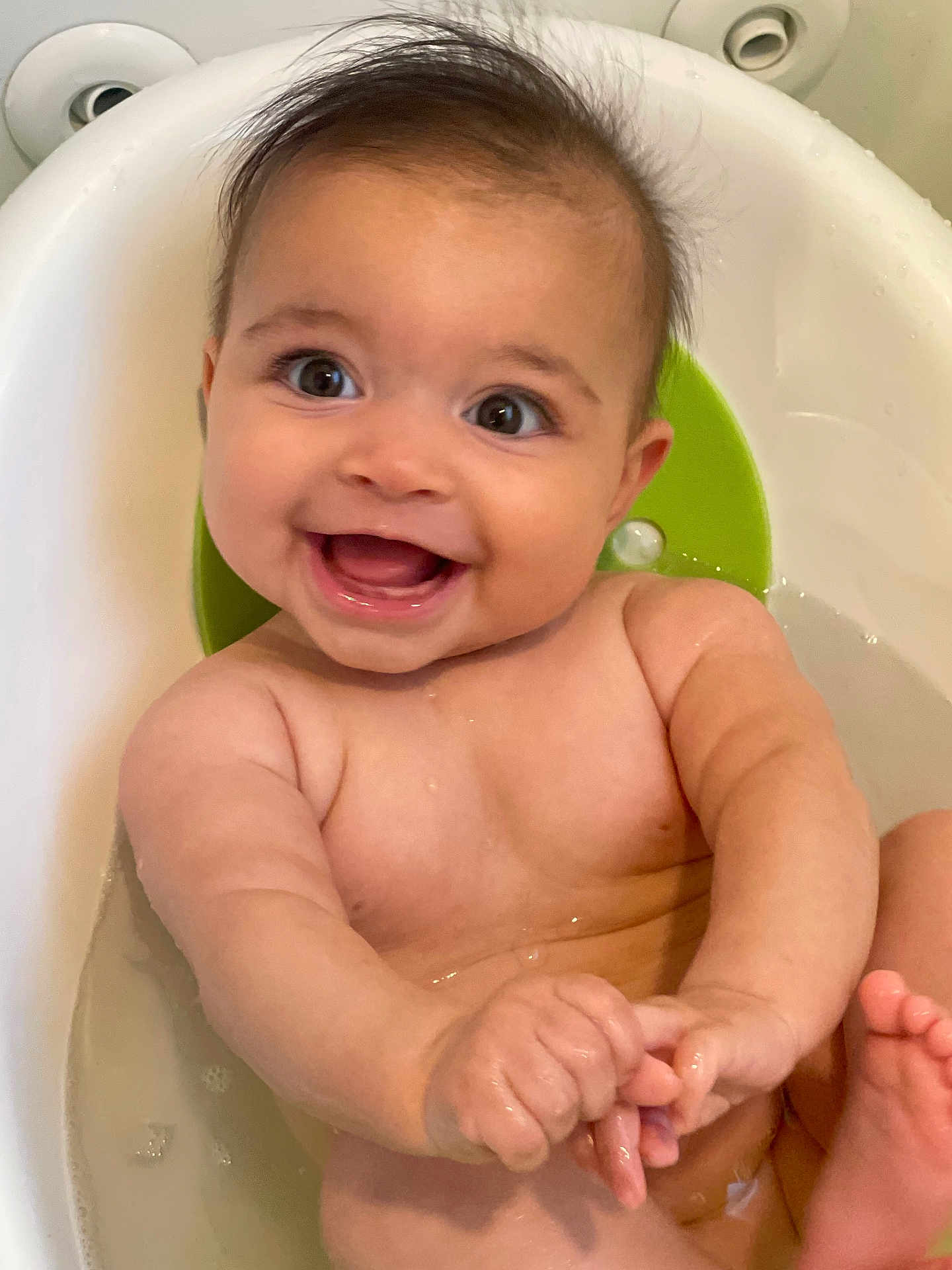 Morgan James joined the competition — help win amazing prizes! baby, bathtub, water, smile, happy, child, infant, skin, hands, feet, sitting, playful, cute, bath, water_droplets, face, young_child, joy, expression, indoors