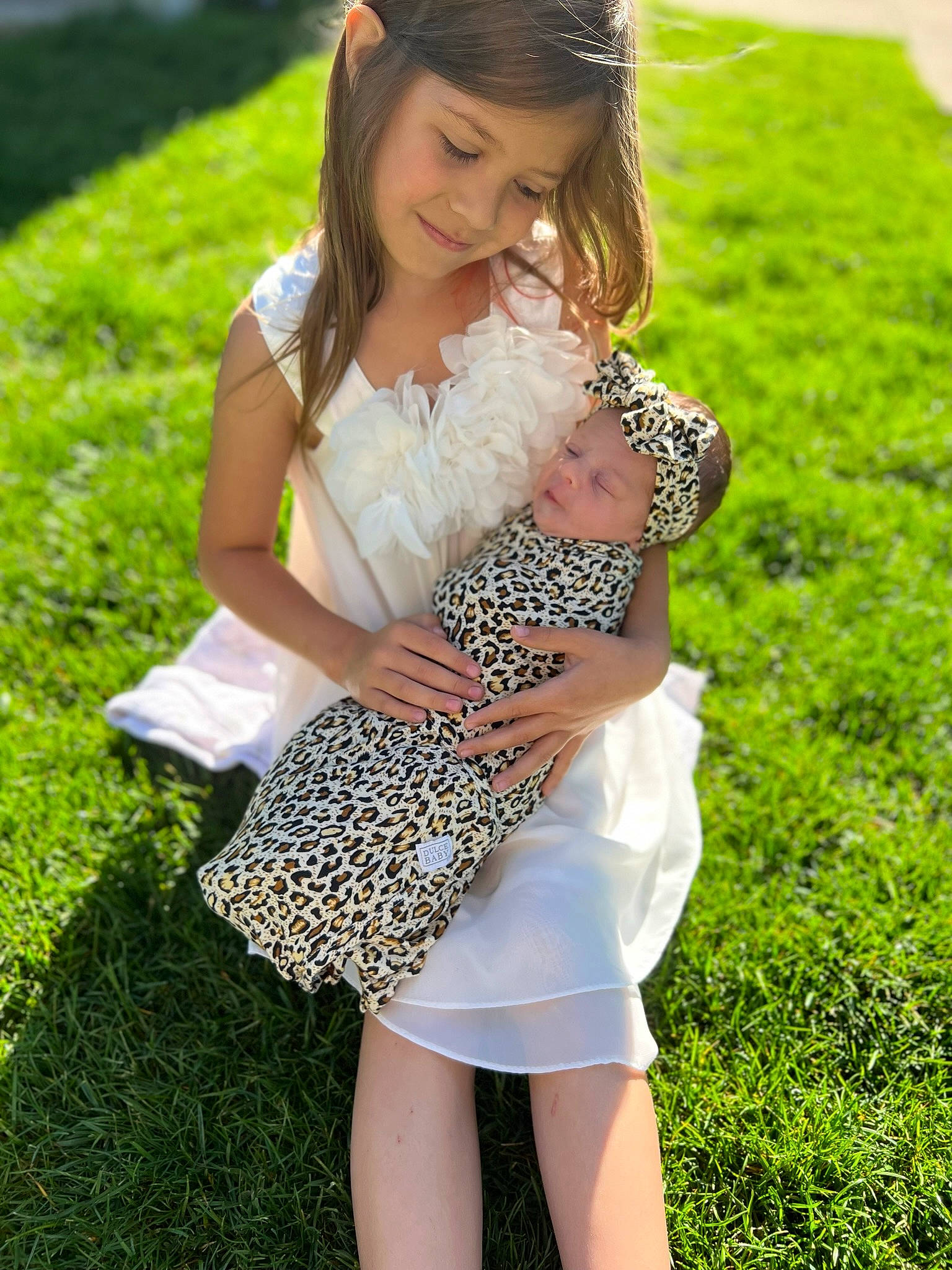 Brooklyn joined the competition — help win amazing prizes! child, eye, facial_expression, fawn, grass, grassland, green, hair, happy, headwear, joy, knee, leg, meadow, people_in_nature, person, plant, shoulder, smile, summer