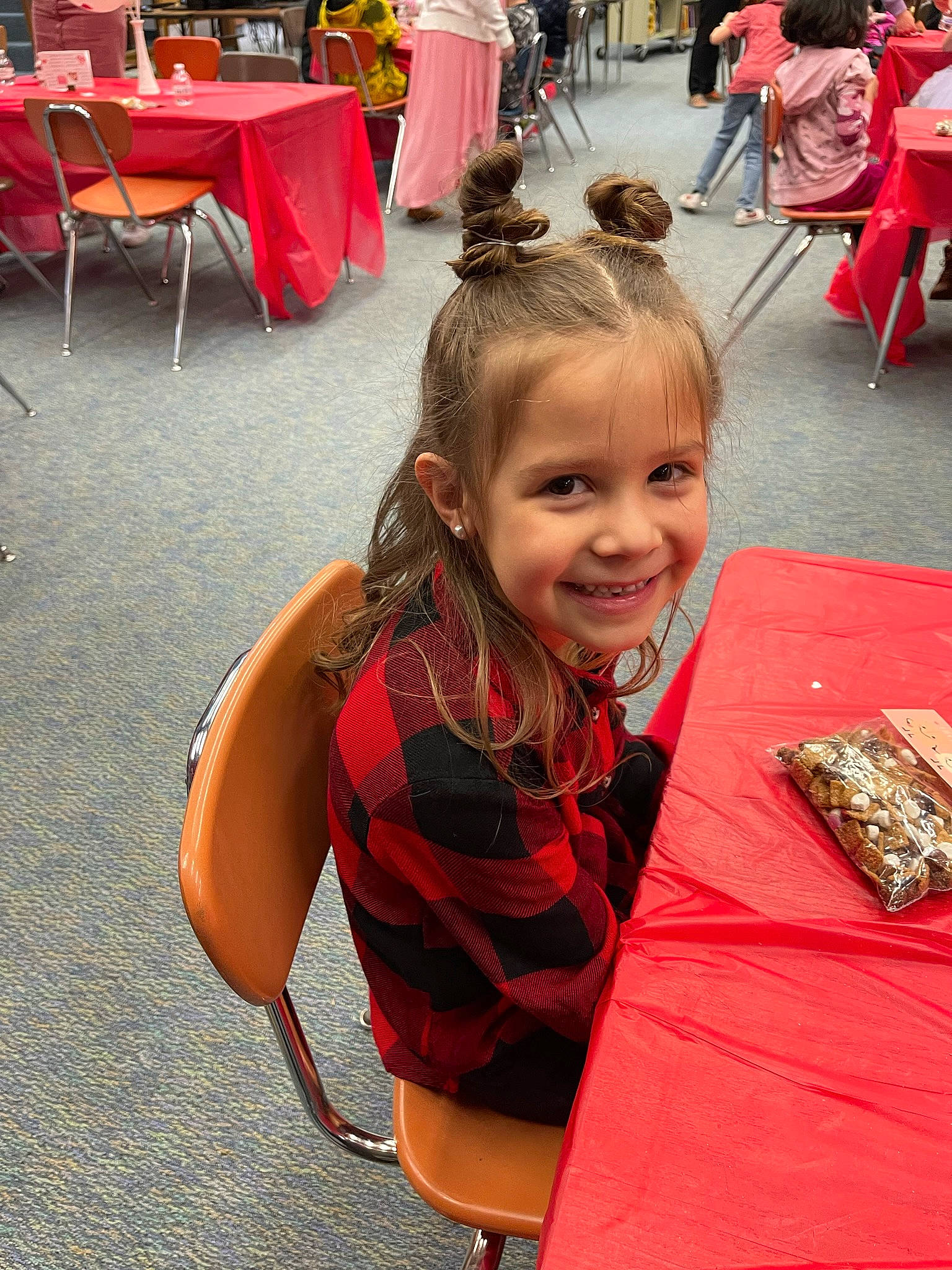 Brooklyn is registered to the contest to win money with this photo: blond, chair, child, event, eyewear, fashion, flooring, fun, hairstyle, happy, joy, leisure, person, recreation, red, shoe, sitting, smile, summer, t_shirt