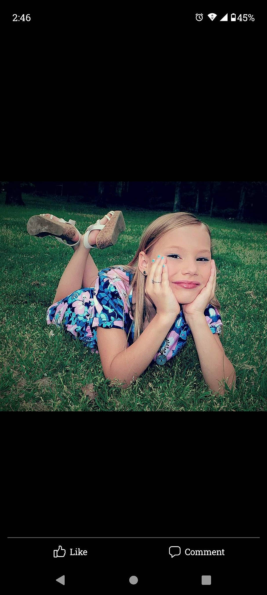 Destiny is registered to the contest to win money with this photo: azure, blond, electric_blue, finger, flash_photography, fun, gesture, grass, grass_family, grassland, hand, happy, human_leg, joy, leisure, long_hair, meadow, people_in_nature, person, plant