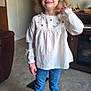 Naomi joined the competition — help win amazing prizes! child, girl, smiling, indoor, blonde_hair, curly_hair, white_blouse, blue_jeans, brown_boots, standing, waving, home_interior, painting, furniture, floor, watch, cute, portrait, happy, casual_clothing