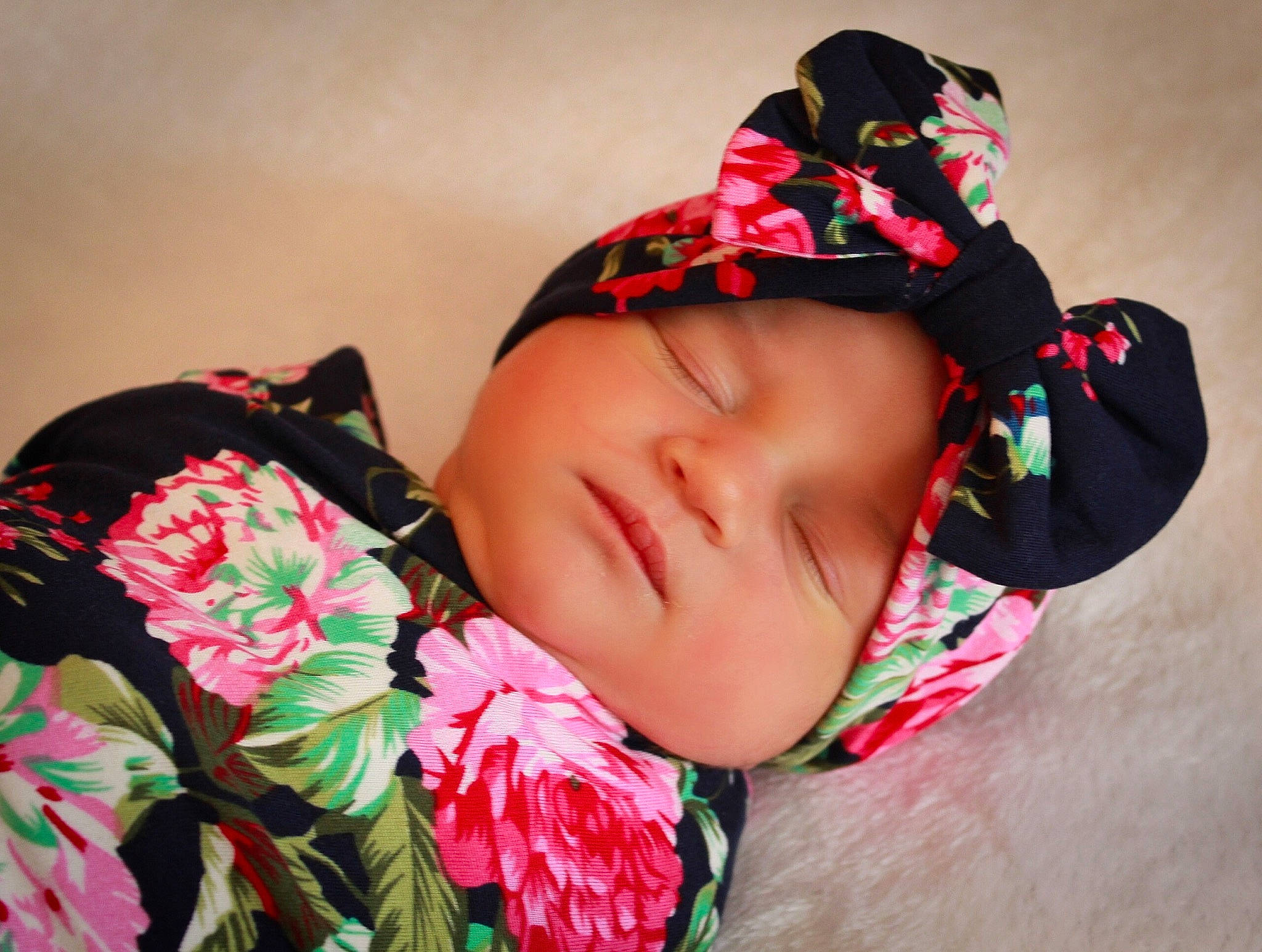 Ryleigh is registered to the contest to win money with this photo: baby, black_hair, child, fashion_accessory, flower, hair_accessory, headband, headgear, headpiece, person, petal, photography, pink, plant, toddler