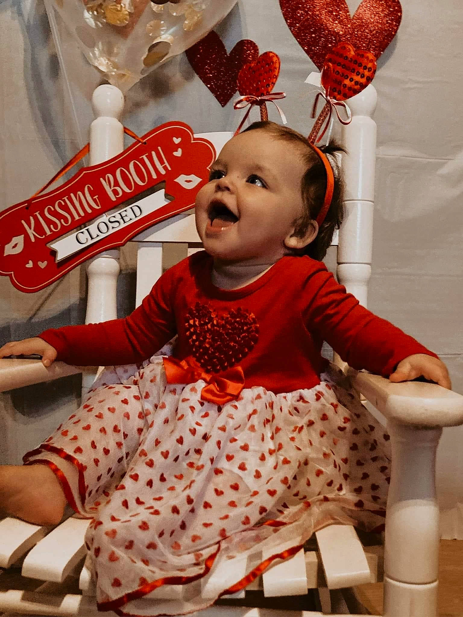 Aubrie is registered to the contest to win money with this photo: baby, baby_toddler_clothing, chair, child, design, event, fun, happy, human, orange, organ, party_supply, peach, person, pink, product, red, sitting, smile, toddler