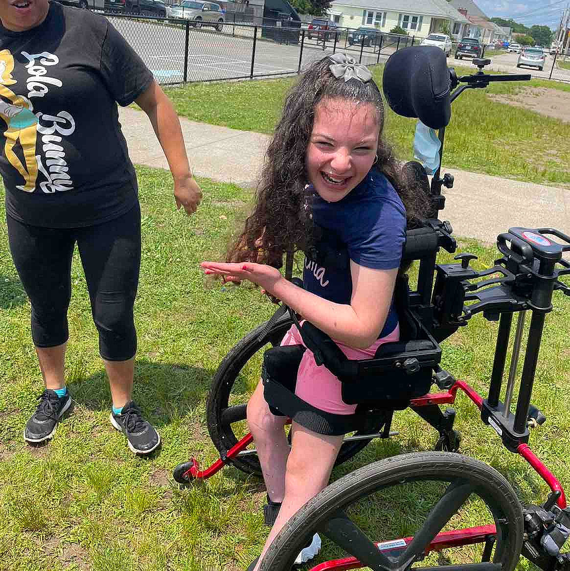 Samara is registered to the contest to win money with this photo: automotive_tire, bicycle, bicycle_accessory, bicycle_clothing, bicycle_fork, bicycle_frame, bicycle_handlebar, bicycle_part, bicycle_saddle, bicycle_tire, bicycle_wheel, bicycles_equipment_and_supplies, grass, joy, person, plant, recreation, shorts, smile, sneakers