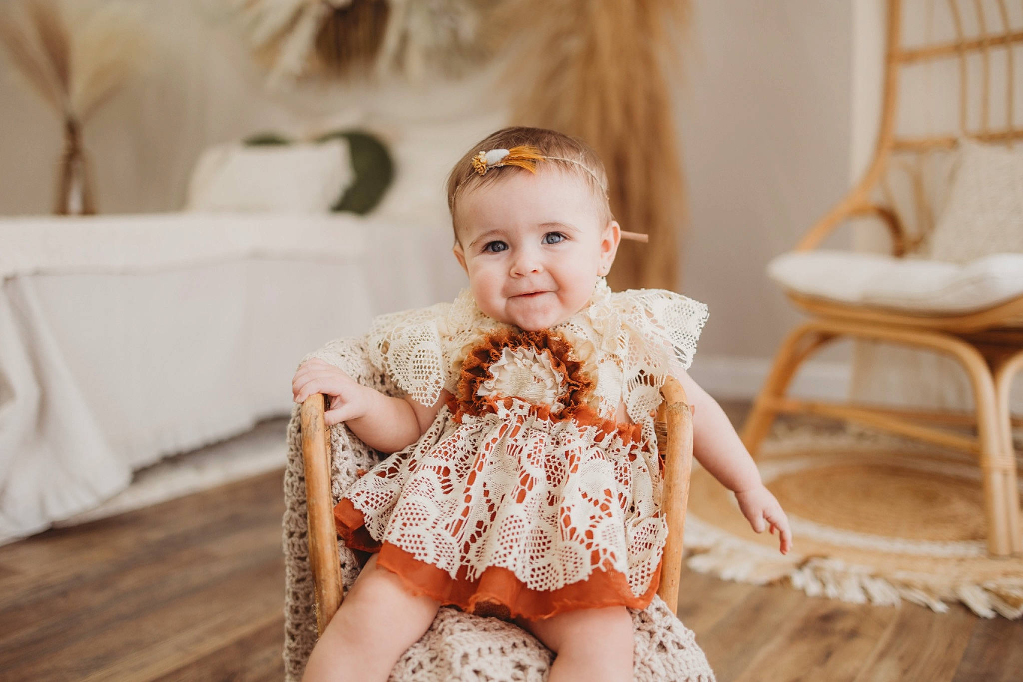 Remington is registered to the contest to win money with this photo: baby, baby_toddler_clothing, chair, embellishment, event, eye, fashion_design, flash_photography, flooring, happy, human_leg, iris, joy, neck, peach, person, sitting, skin, smile, thigh