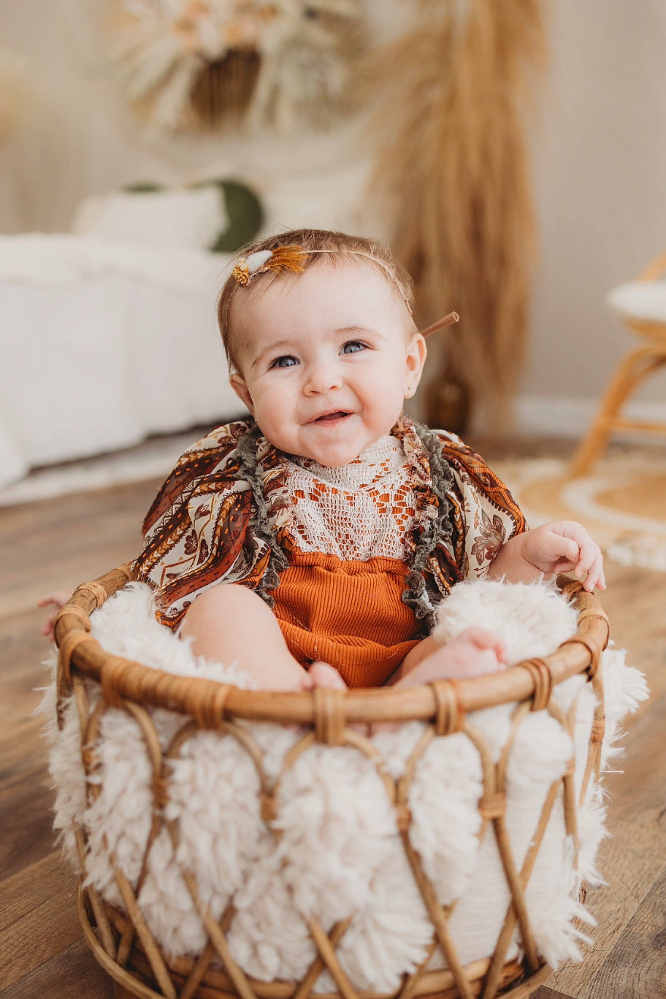 Remington is registered to the contest to win money with this photo: baby, baby_toddler_clothing, basket, chair, child, comfort, event, fashion_accessory, flash_photography, happy, joy, pattern, peach, person, portrait_photography, sitting, smile, storage_basket, toddler, white