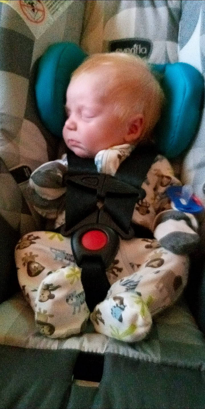 Christen is registered to the contest to win money with this photo: baby, baby_carriage, baby_in_car_seat, baby_products, baby_sleeping, baby_toddler_clothing, bedtime, car_seat, cheek, child, comfort, head, lap, linens, person, room, sitting, skin, stuffed_toy, toddler