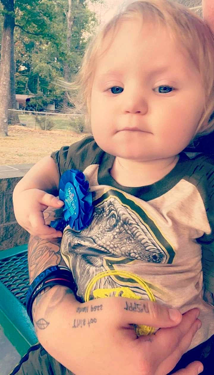 Christen Hayes joined the competition — help win amazing prizes! baby_toddler_clothing, blue, cool, eyelash, facial_expression, finger, grass, hairstyle, happy, human, iris, organ, person, plant, shoulder, skin, sleeve, summer, temporary_tattoo, toddler