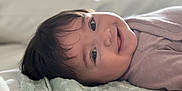 Freya joined the competition — help win amazing prizes! baby, blanket, child, closeup, clothing, cozy, cute, expression, face, happy, head, indoors, infant, lying_down, portrait, relaxed, skin, smiling, soft_texture, young