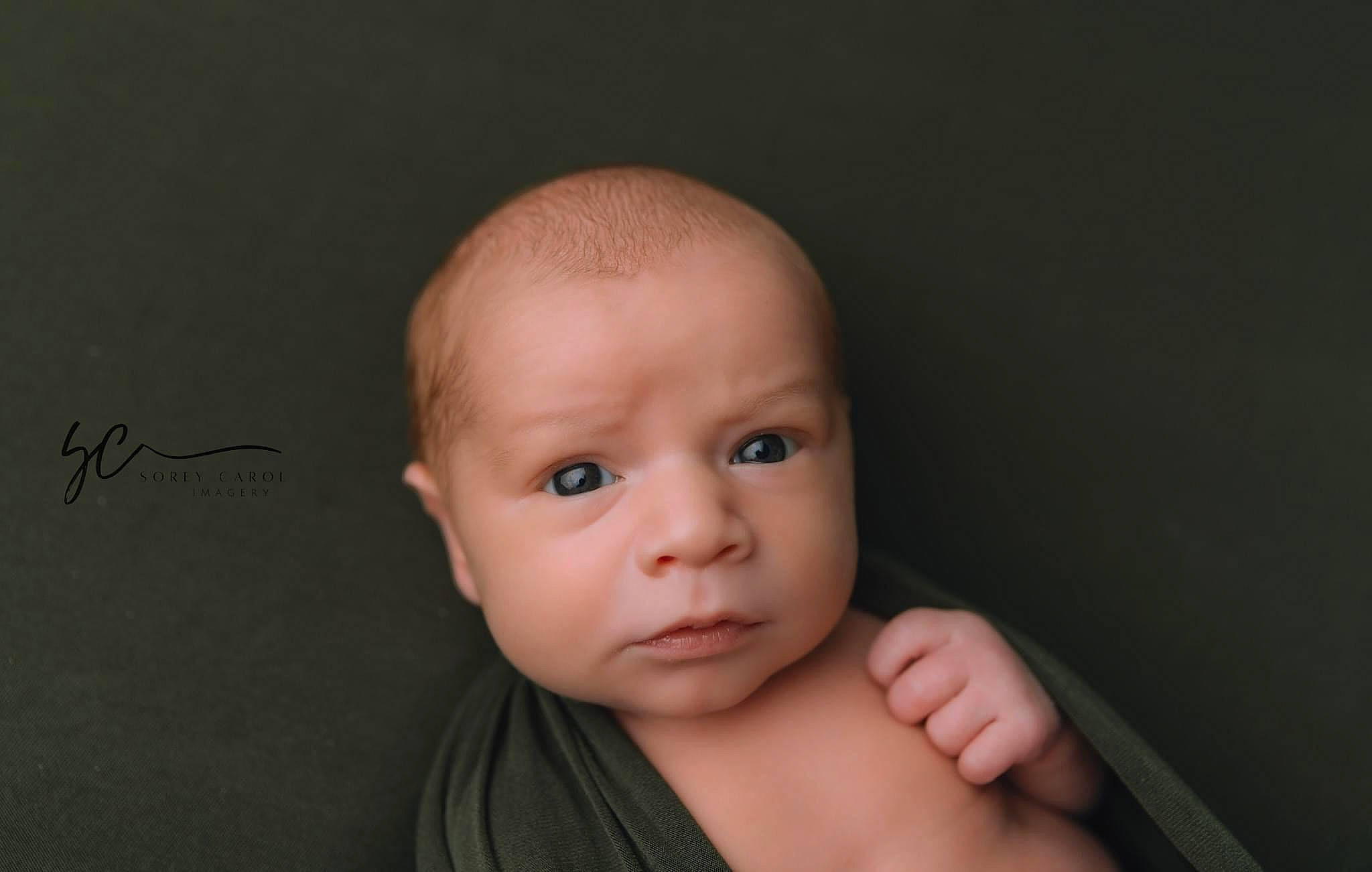Larrit Scott is registered to the contest to win money with this photo: baby, baby_toddler_clothing, cheek, chest, child, elbow, eyelash, flash_photography, gesture, happy, iris, lip, nail, neck, no_expression, nose, person, sitting, stomach, thumb