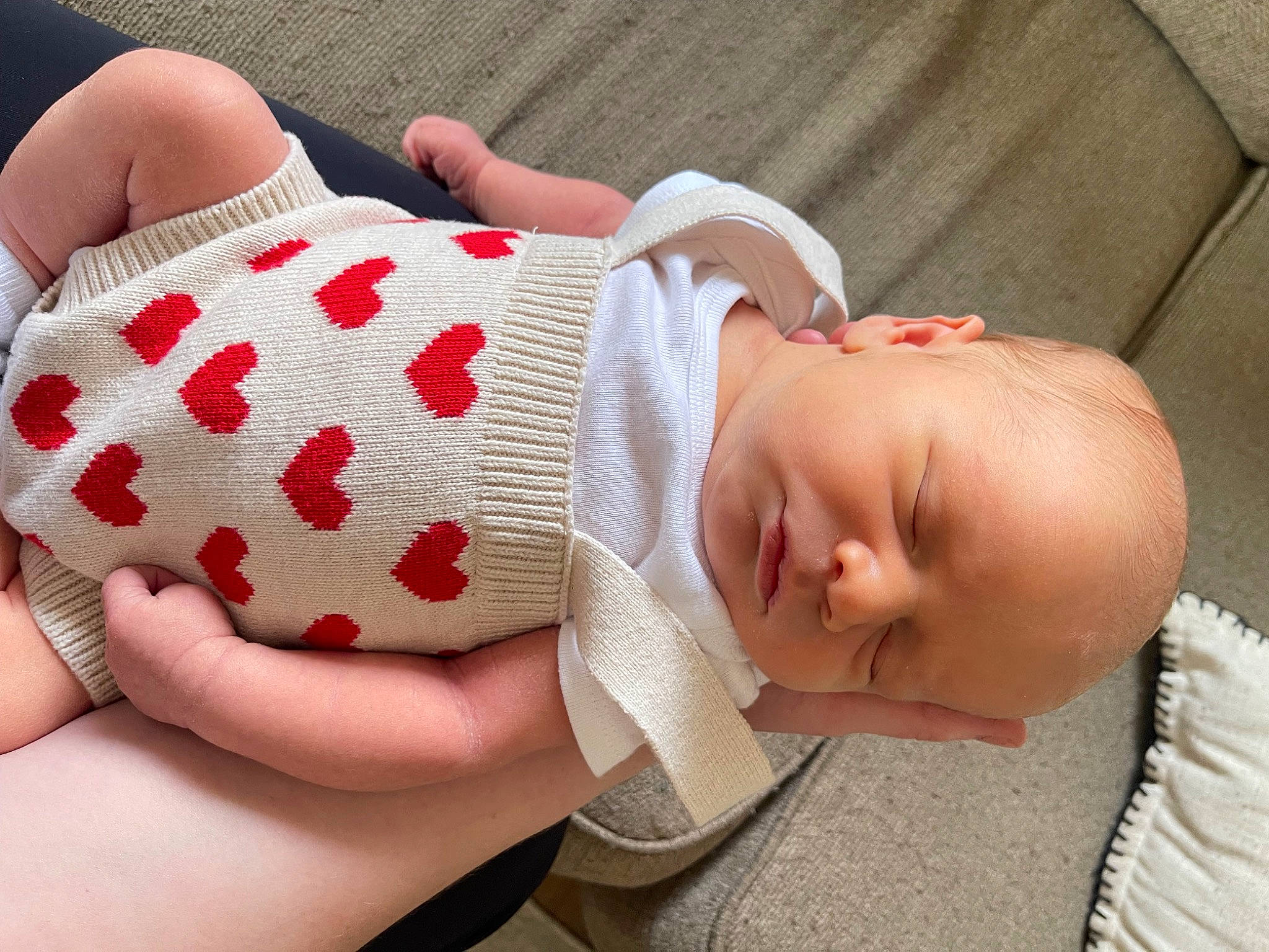 Larrit Scott is registered to the contest to win money with this photo: baby, baby_products, baby_sleeping, baby_toddler_clothing, child, comfort, fashion_accessory, finger, hand, headgear, human_leg, linens, nail, pattern, person, skin, sleeve, thigh, thumb, toddler