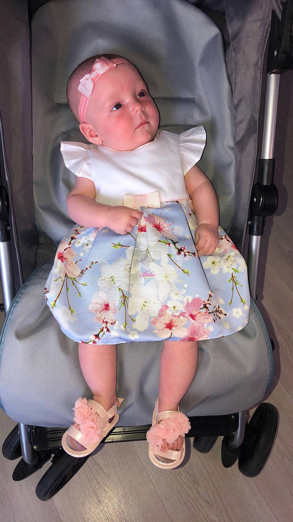 Connie joined the competition — help win amazing prizes! baby, baby_carriage, baby_products, child, dress, person, pink, product, sitting, toddler