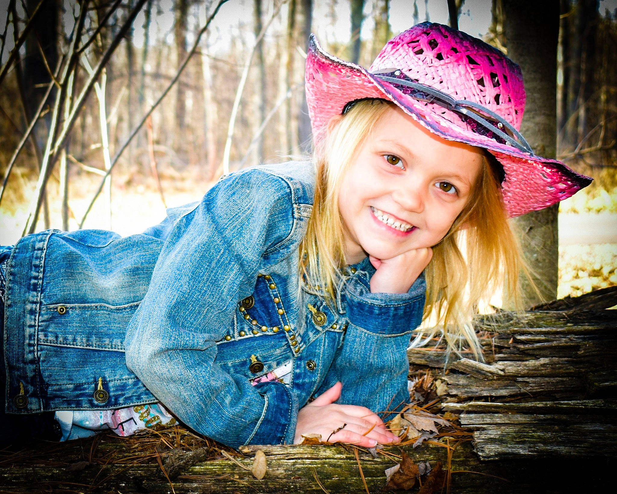 Mallory is registered to the contest to win money with this photo: beauty, blond, child, child_model, clothing, cowboy_hat, eye, facial_expression, fashion_accessory, grass, hat, headgear, headwear, joy, person, photograph, photography, pink, portrait, portrait_photography