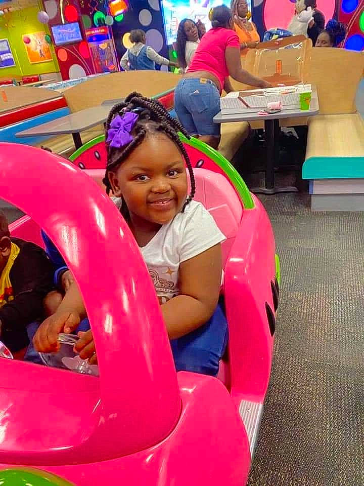 Nyla joined the competition — help win amazing prizes! automotive_design, automotive_exterior, automotive_tire, automotive_wheel_system, blurred, bumper, car, event, fun, happy, hood, joy, leisure, magenta, motor_vehicle, person, pink, product, recreation, smile