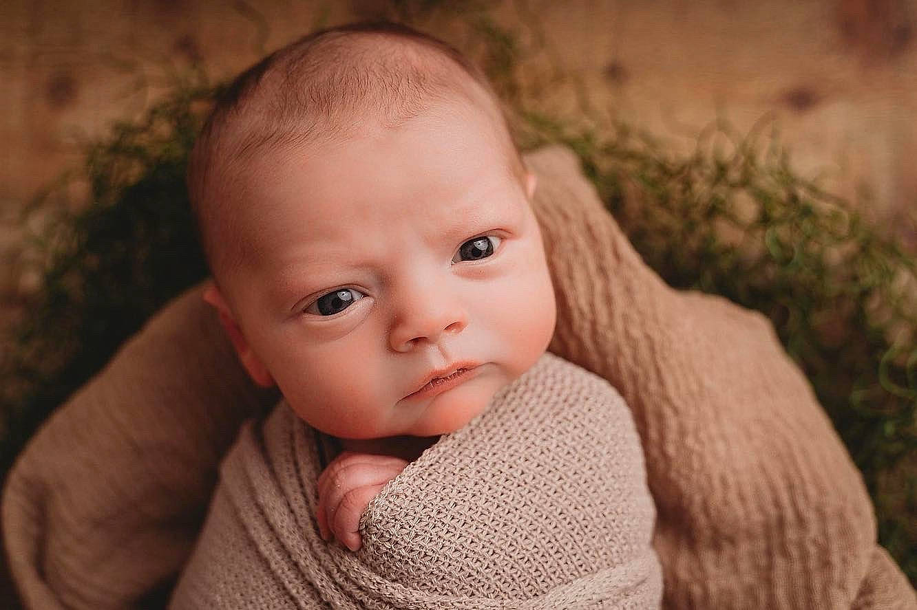 Jamie is registered to the contest to win money with this photo: baby, baby_toddler_clothing, cheek, child, finger, flash_photography, grass, happy, lip, monochrome_photography, nail, nose, pattern, person, portrait_photography, sitting, skin, thumb, toddler, wood