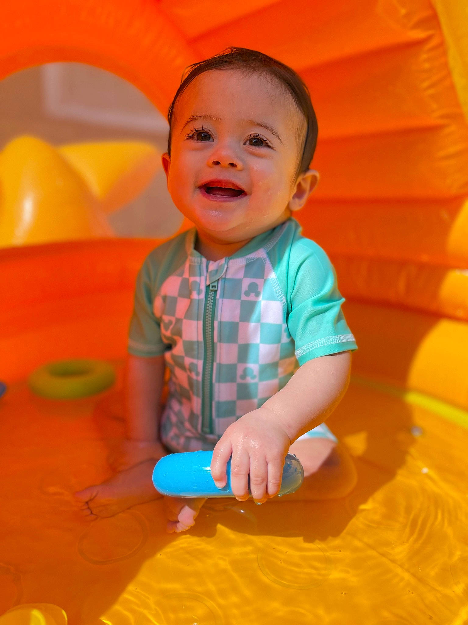 Emerson James is registered to the contest to win money with this photo: baby, baby_toddler_clothing, child, facial_expression, fun, happy, joy, leisure, nose, orange, person, pink, product, recreation, red, skin, sleeve, smile, standing, summer