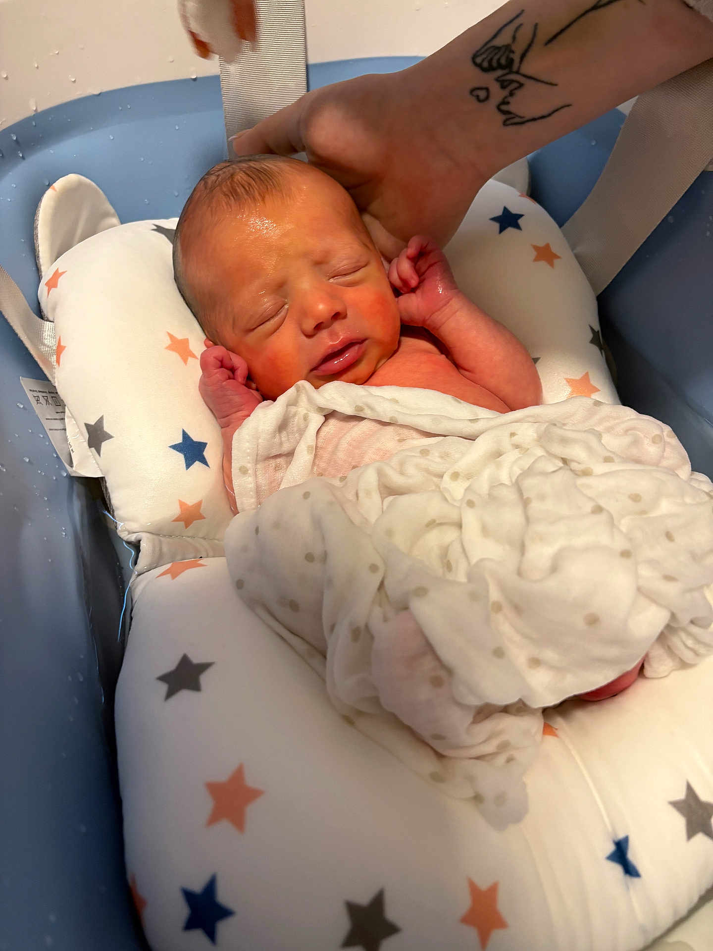 Roman joined the competition — help win amazing prizes! newborn, baby, infant, sleeping, blanket, bath, water, hand, tattoo, cushion, stars, blue, white, polka_dots, face, skin, peaceful, cozy, indoor, portrait