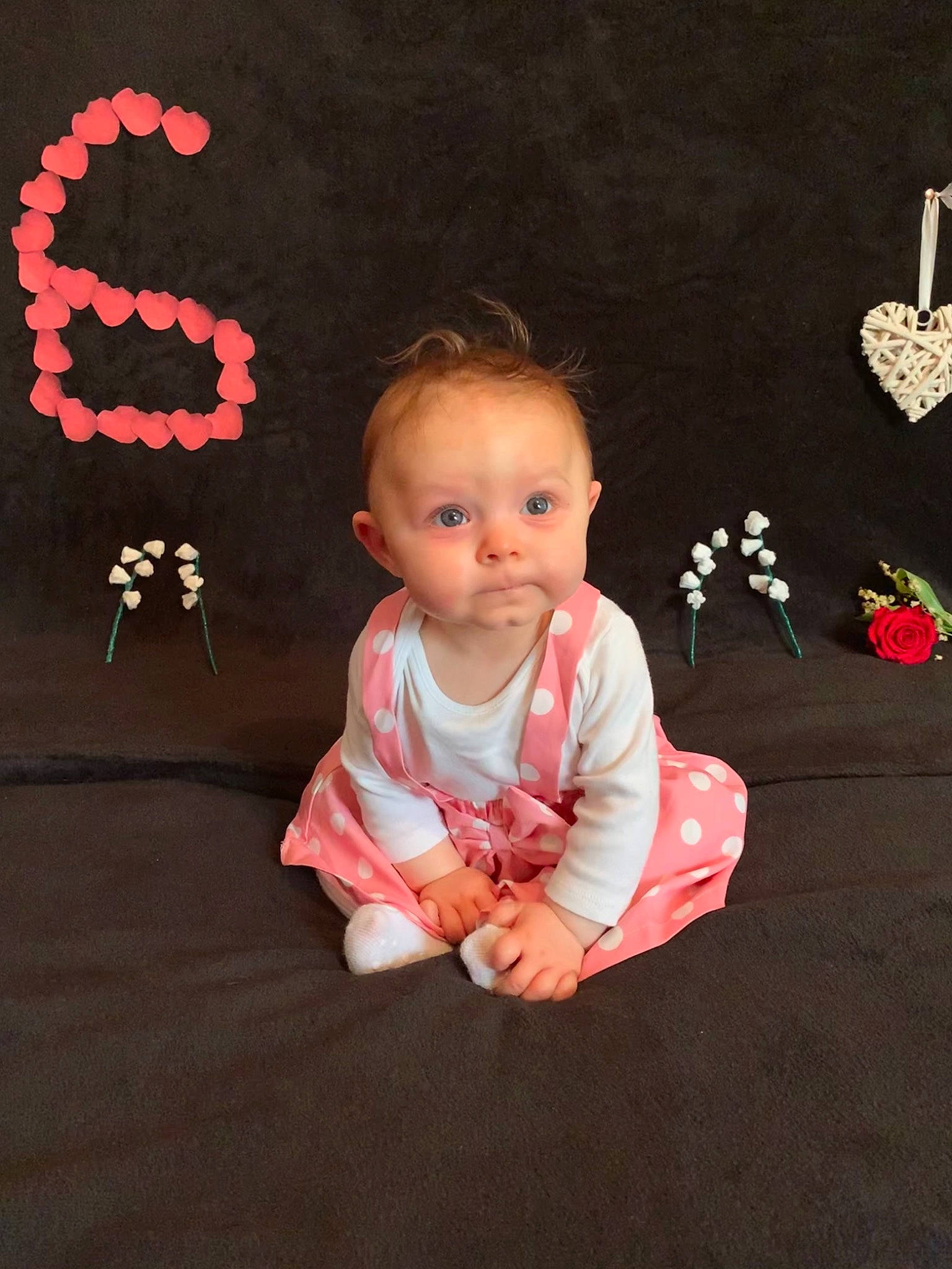 Malyana participe au concours pour gagner de l'argent avec cette photo : baby, baby_toddler_clothing, cheek, chin, facial_expression, flash_photography, flooring, fun, grass, hair, happy, head, human_body, person, pink, plant, sleeve, standing, textile, toddler