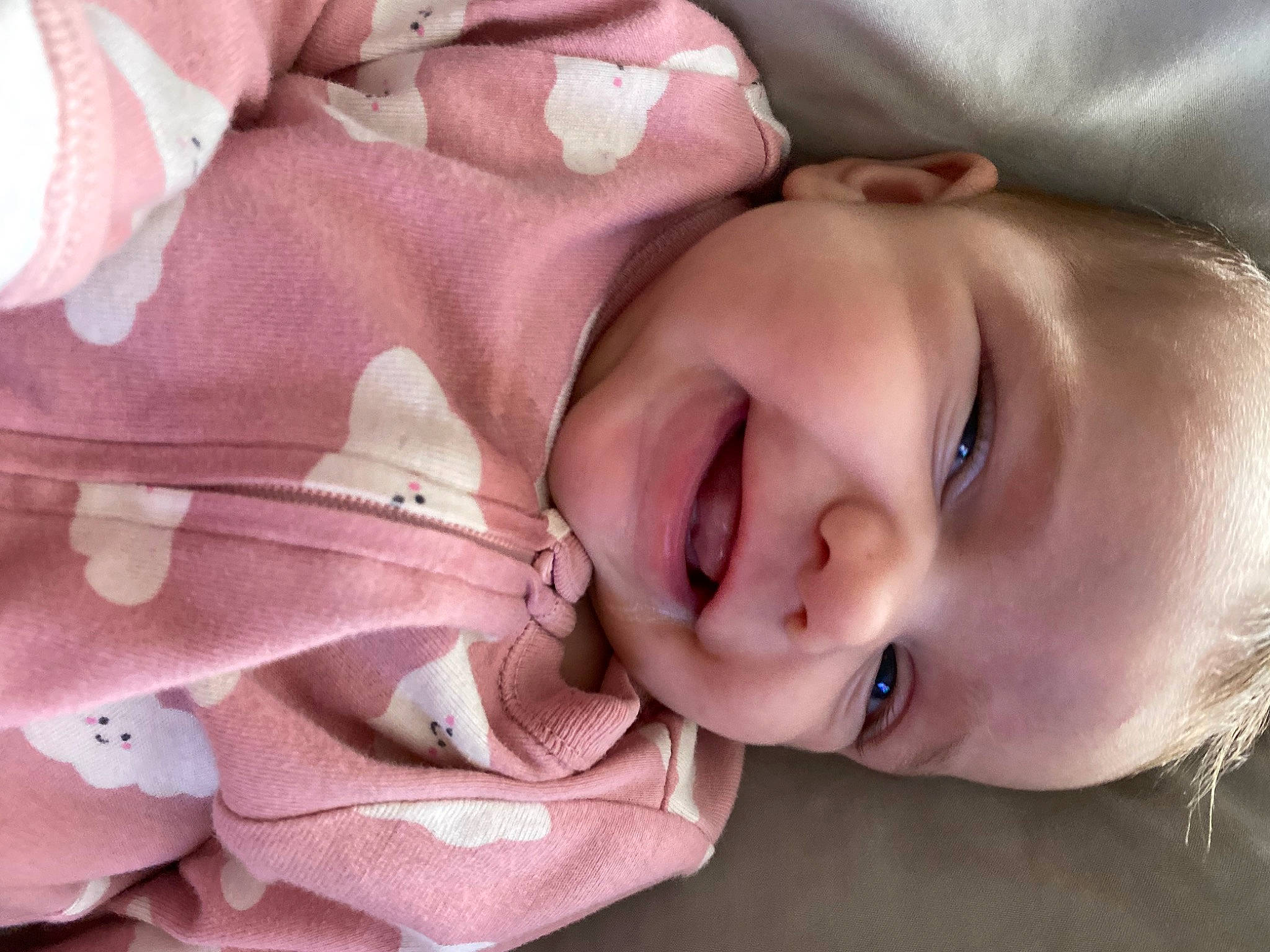 Emelia is registered to the contest to win money with this photo: baby, cheek, chin, comfort, ear, eyebrow, eyelash, happy, iris, lip, mouth, neck, nose, person, pink, product, skin, sleeve, smile, textile