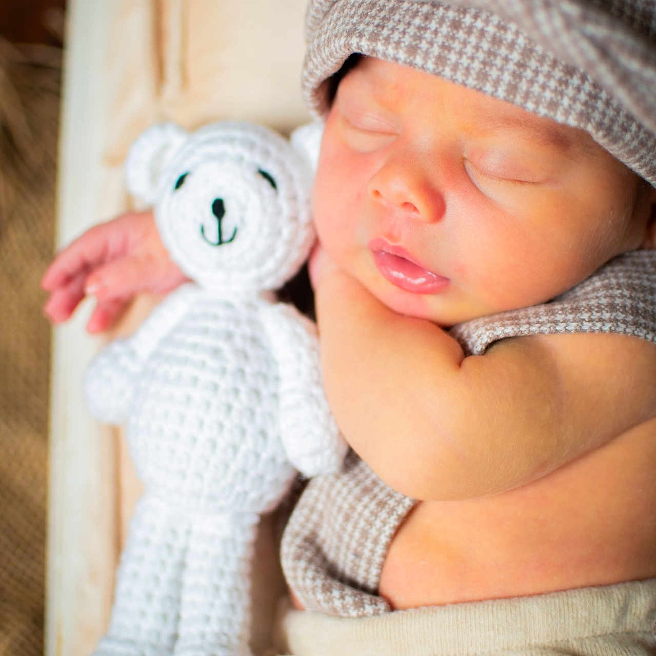 Zayyden joined the competition — help win amazing prizes! baby, child, closeup, clothing, cozy, crochet, cute, fabric, hand, hat, indoors, infant, newborn, peaceful, portrait, relaxed, resting, sleeping, soft, teddy_bear