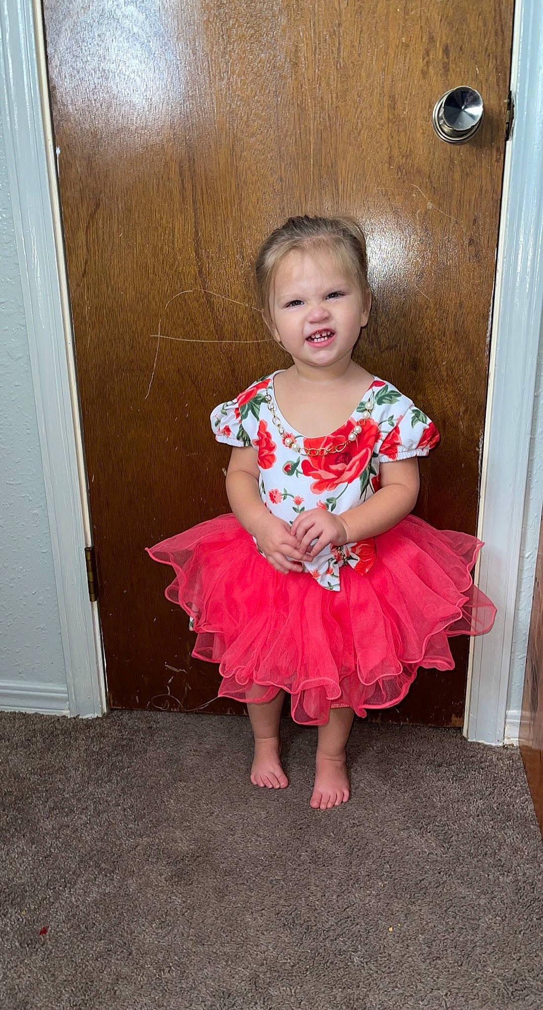 Jacelynn is registered to the contest to win money with this photo: baby_toddler_clothing, clothing, day_dress, dress, embellishment, happy, human_body, iris, joint, leg, one_piece_garment, person, pink, shoulder, skin, sleeve, smile, standing, toddler, waist