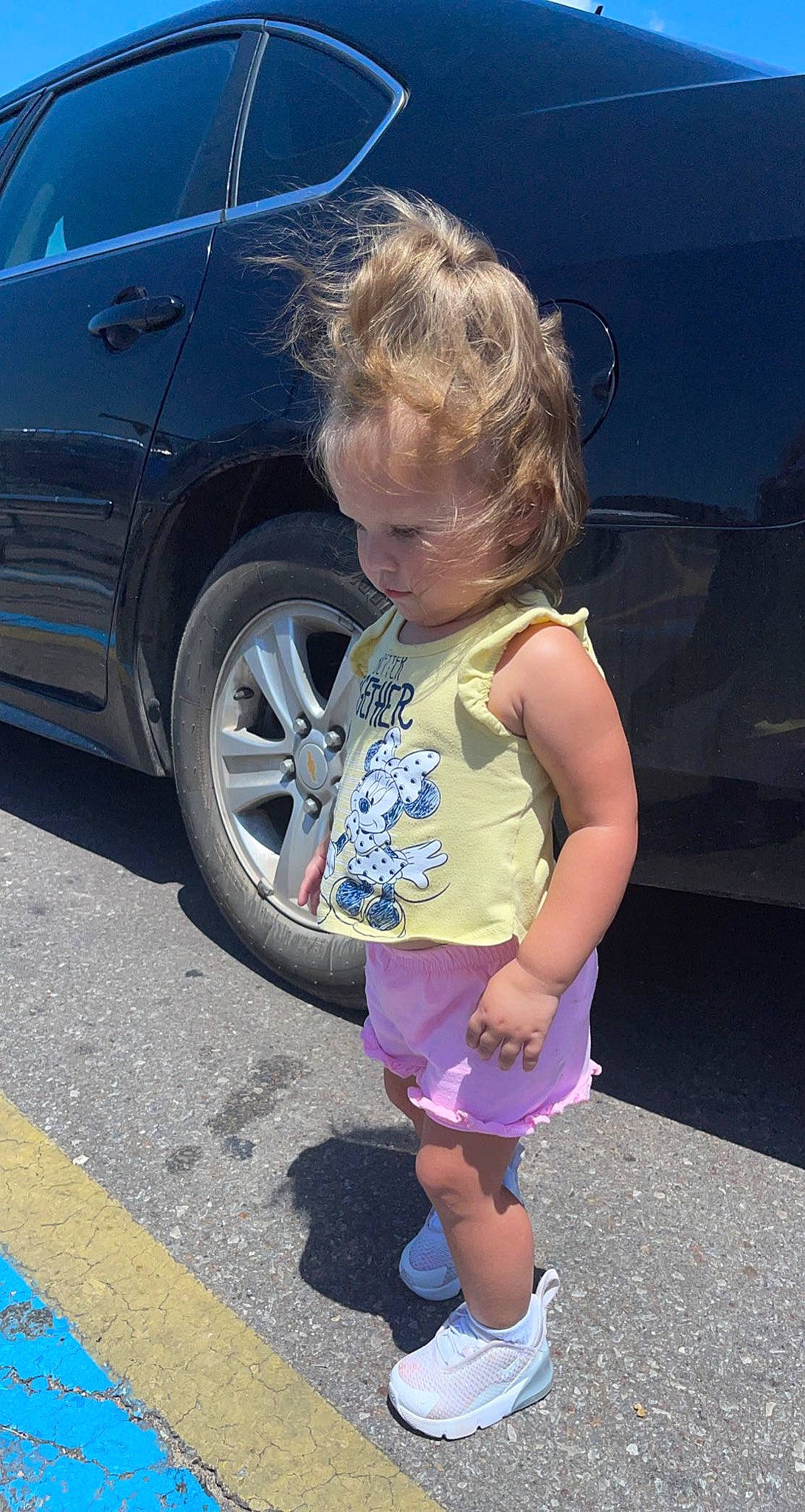 Jacelynn joined the competition — help win amazing prizes! alloy_wheel, asphalt, automotive_design, automotive_exterior, automotive_lighting, automotive_tire, bumper, car, electric_blue, fender, hood, motor_vehicle, person, public_space, rim, tints_and_shades, tire, toddler, vehicle, vehicle_door