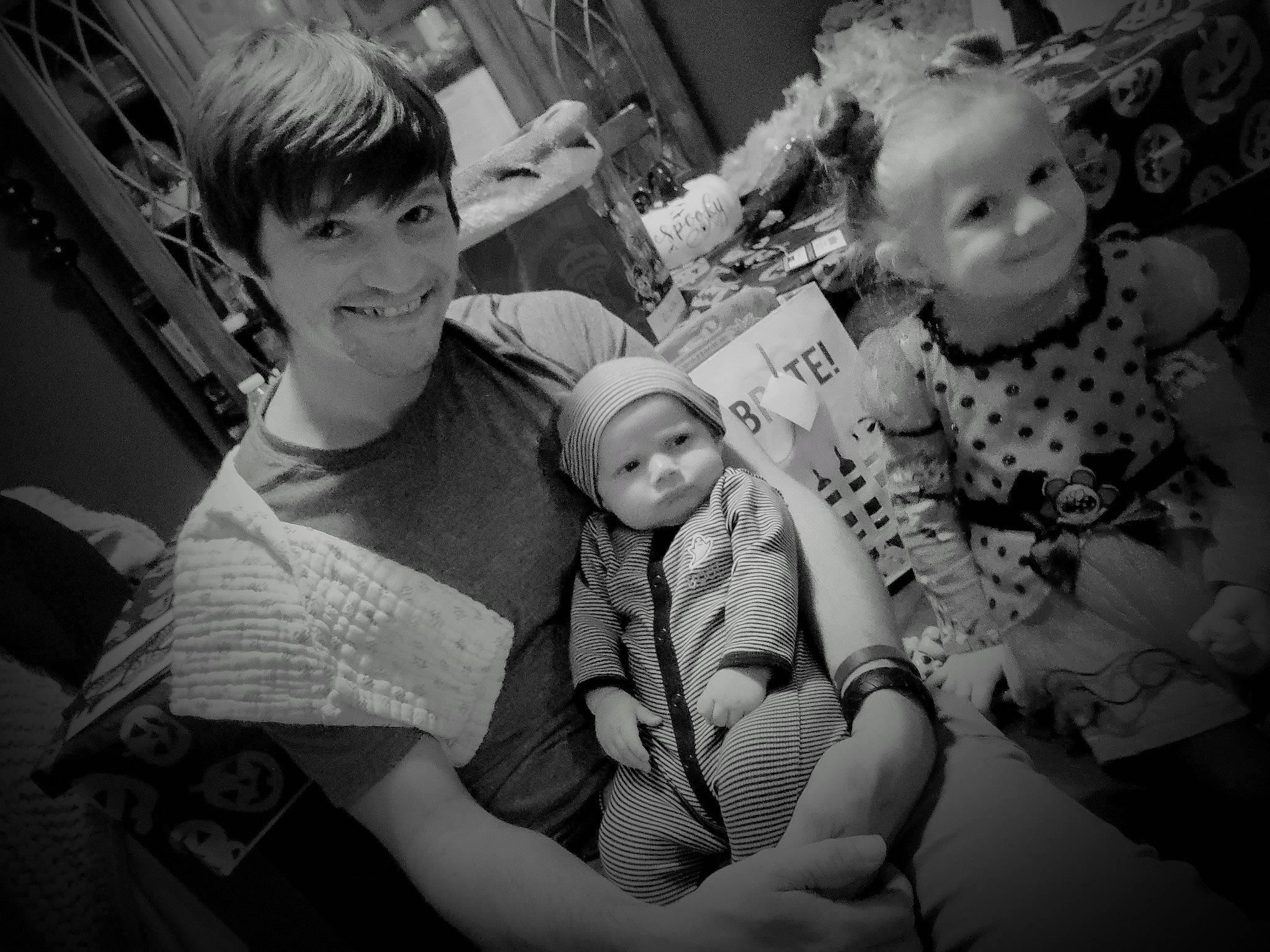 Ryker joined the competition — help win amazing prizes! baby, black_and_white, child, comfort, event, flash_photography, fun, gesture, hand, happy, headwear, joy, monochrome, monochrome_photography, person, room, sitting, smile, snapshot, style