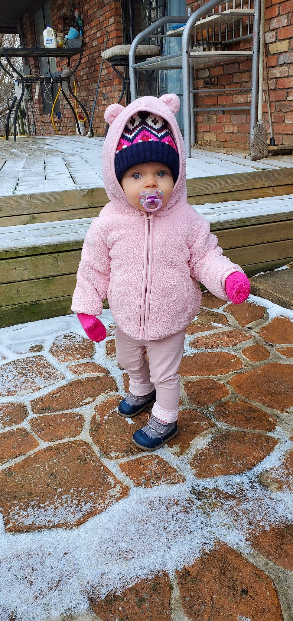 Avri is registered to the contest to win money with this photo: child, headgear, outerwear, person, pink, play, snow, toddler, winter