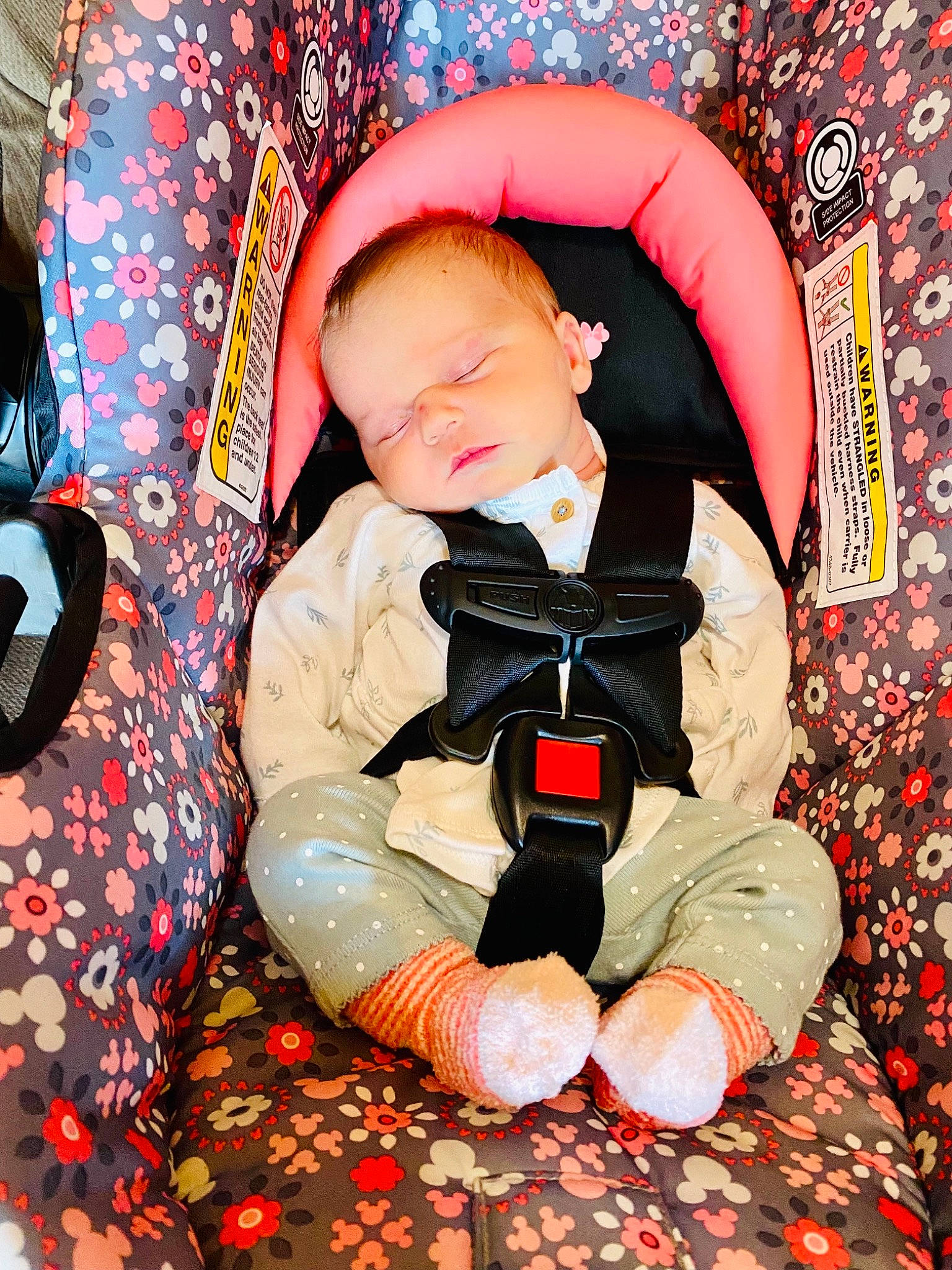 Lea is registered to the contest to win money with this photo: baby, baby_products, baby_sleeping, baby_toddler_clothing, car_seat, carmine, child, comfort, fun, happy, lap, linens, nap, orange, pattern, person, play, red, sitting, textile