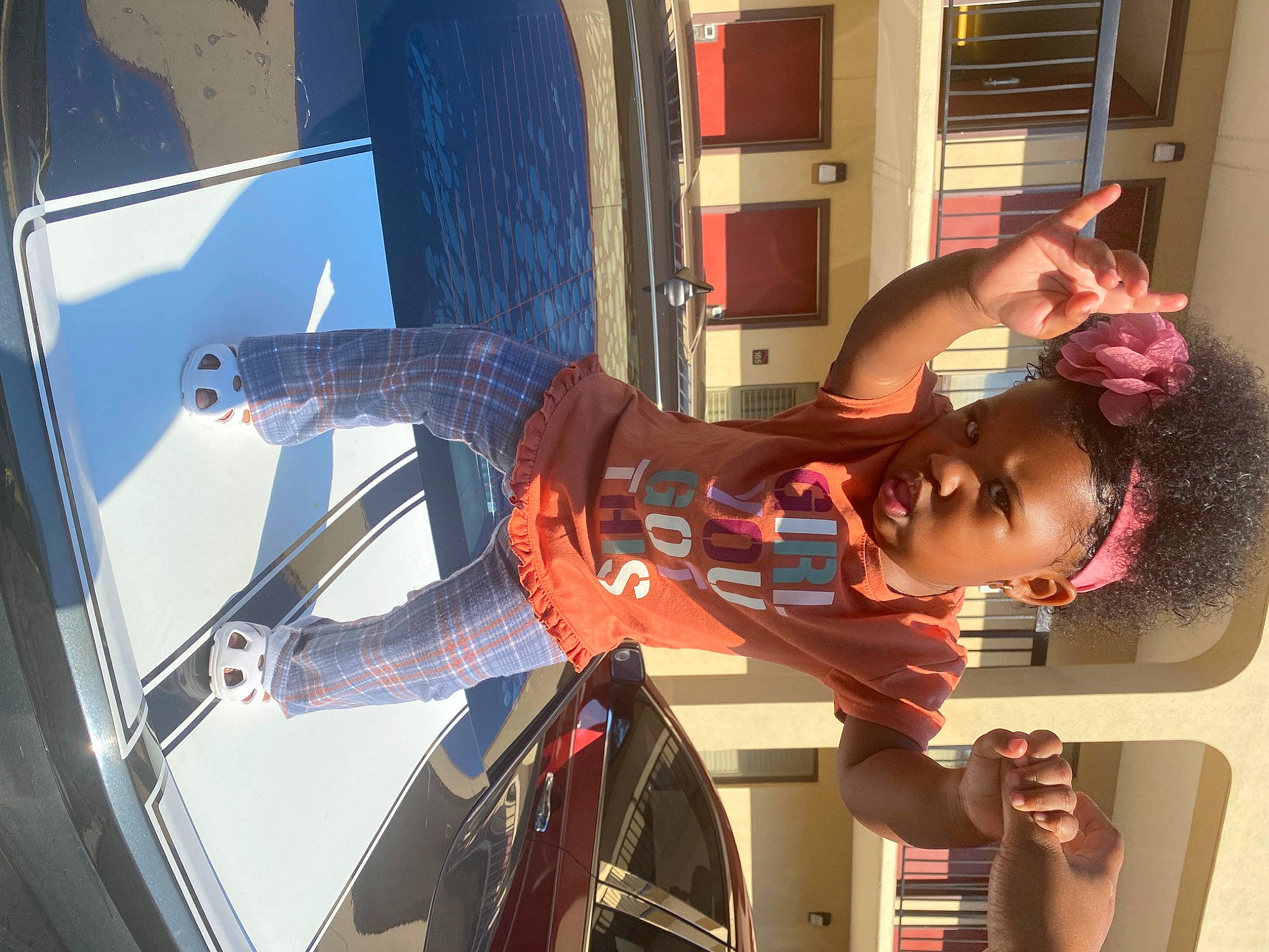 Aunteria is registered to the contest to win money with this photo: aerospace_engineering, automotive_design, automotive_exterior, automotive_lighting, engineering, event, eyewear, fictional_character, fun, machine, magenta, person, tire, vehicle_door, wheel