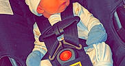 Bentley joined the competition — help win amazing prizes! newborn, baby, car_seat, sleeping, mittens, hat, infant, safety_harness, black, clothing, cute, peaceful, indoors, resting, child, small, seat, transportation, comfort, nap