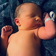 Bentley joined the competition — help win amazing prizes! newborn, baby, sleeping, diaper, blanket, hospital_wristband, infant, skin, peaceful, resting, cute, soft_texture, child, young, portrait, human, toddler, body, relaxation, indoor