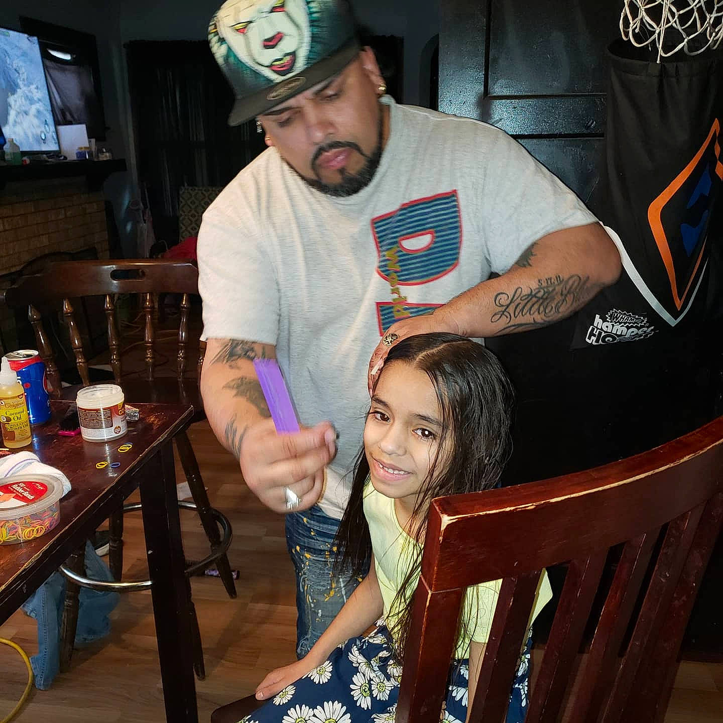 Francheska is registered to the contest to win money with this photo: arm, cap, chair, headgear, headwear, joy, person, t_shirt, tattoo