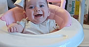 Abigail Joy is registered to the contest to win money with this photo: baby, walker, smiling, infant, pink, white, clothing, face, child, indoor, happy, toy, baby_equipment, pampers, seat, floor, headwear, cute, person, babywalker