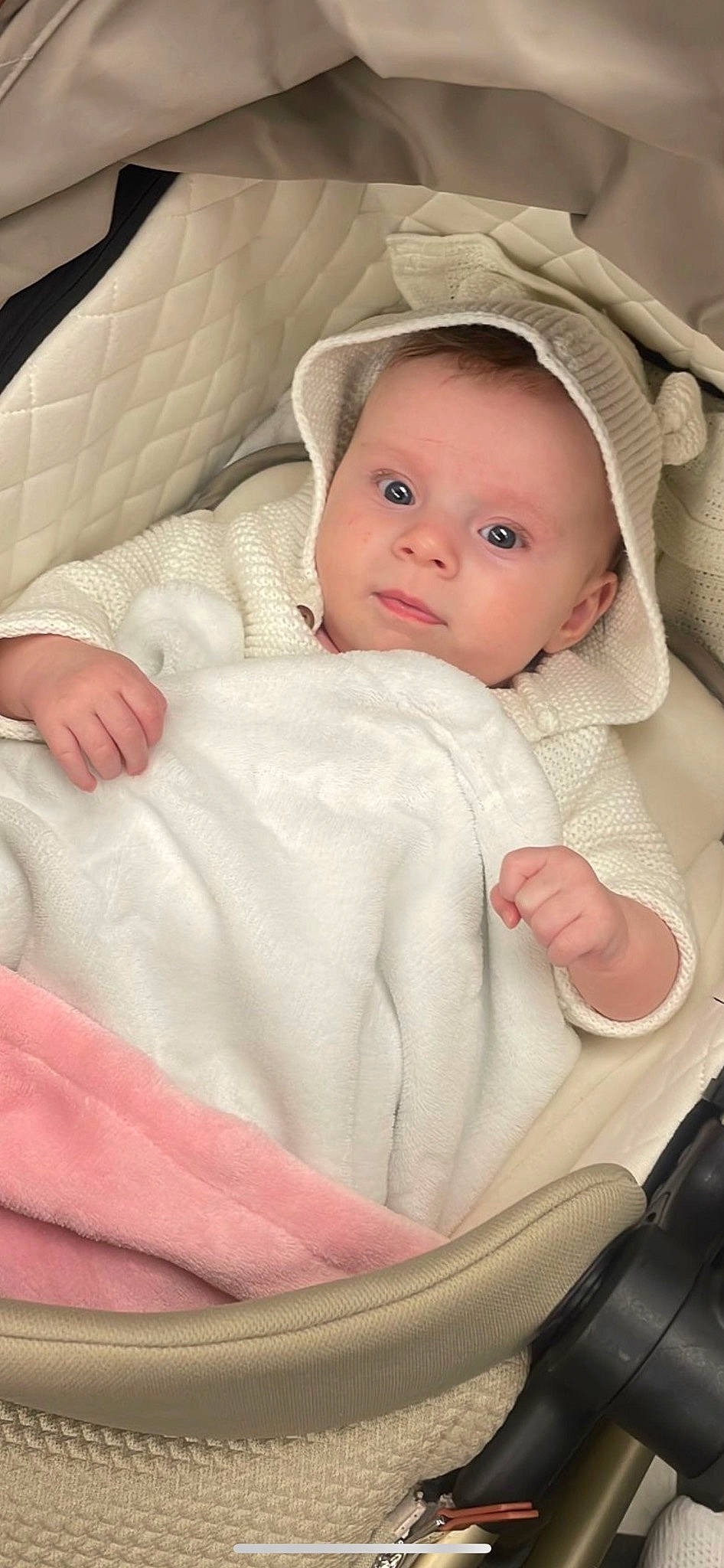 Lucia is registered to the contest to win money with this photo: baby, baby_products, baby_safety, baby_sleeping, baby_toddler_clothing, beige, cheek, child, comfort, eye, face, iris, linens, person, portrait_photography, sitting, skin, sleeve, toddler