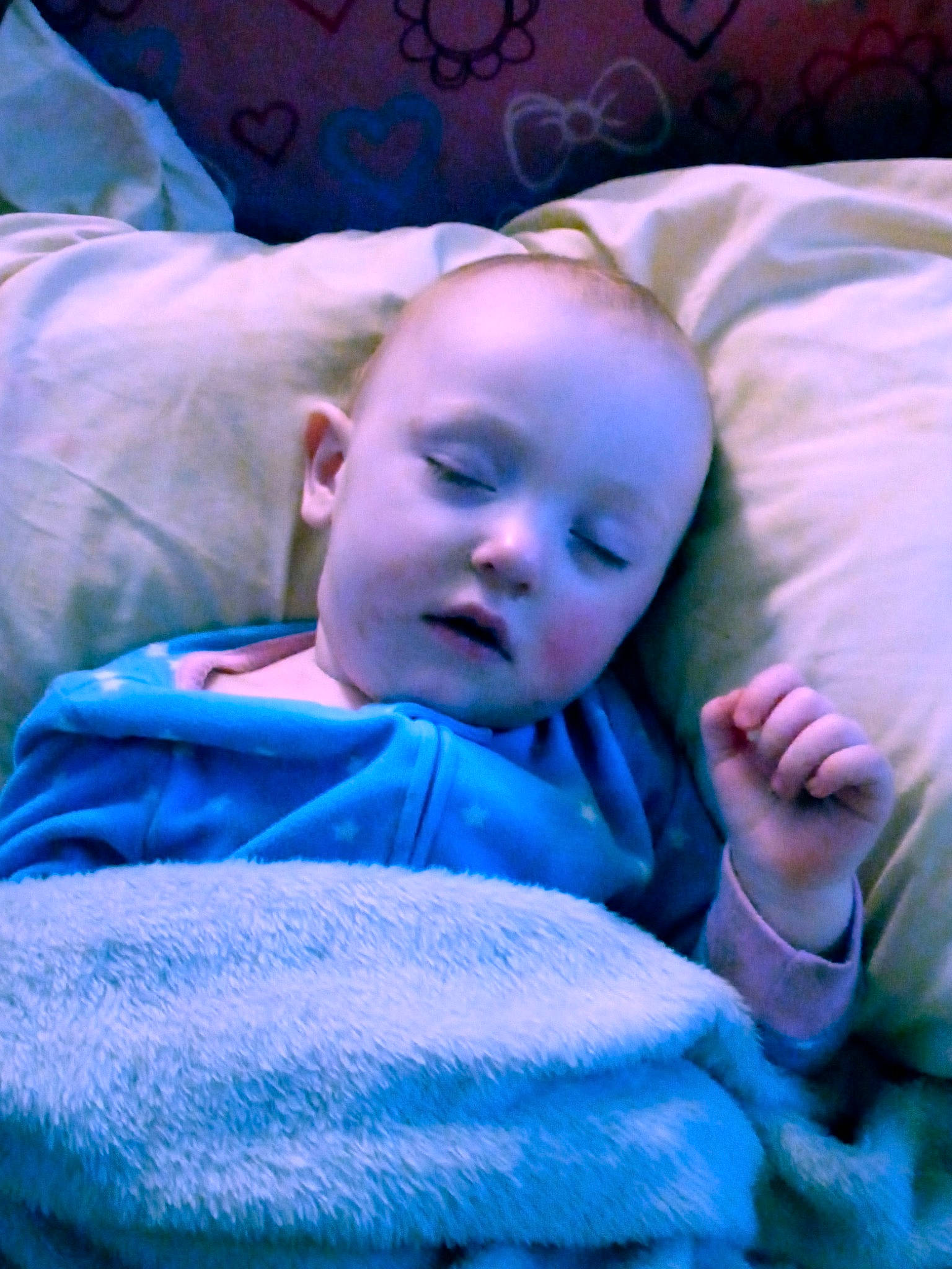 Honey is registered to the contest to win money with this photo: baby, baby_toddler_clothing, bedtime, blue, cheek, child, comfort, electric_blue, flash_photography, fun, grass, happy, linens, magenta, mouth, person, purple, room, sitting, smile