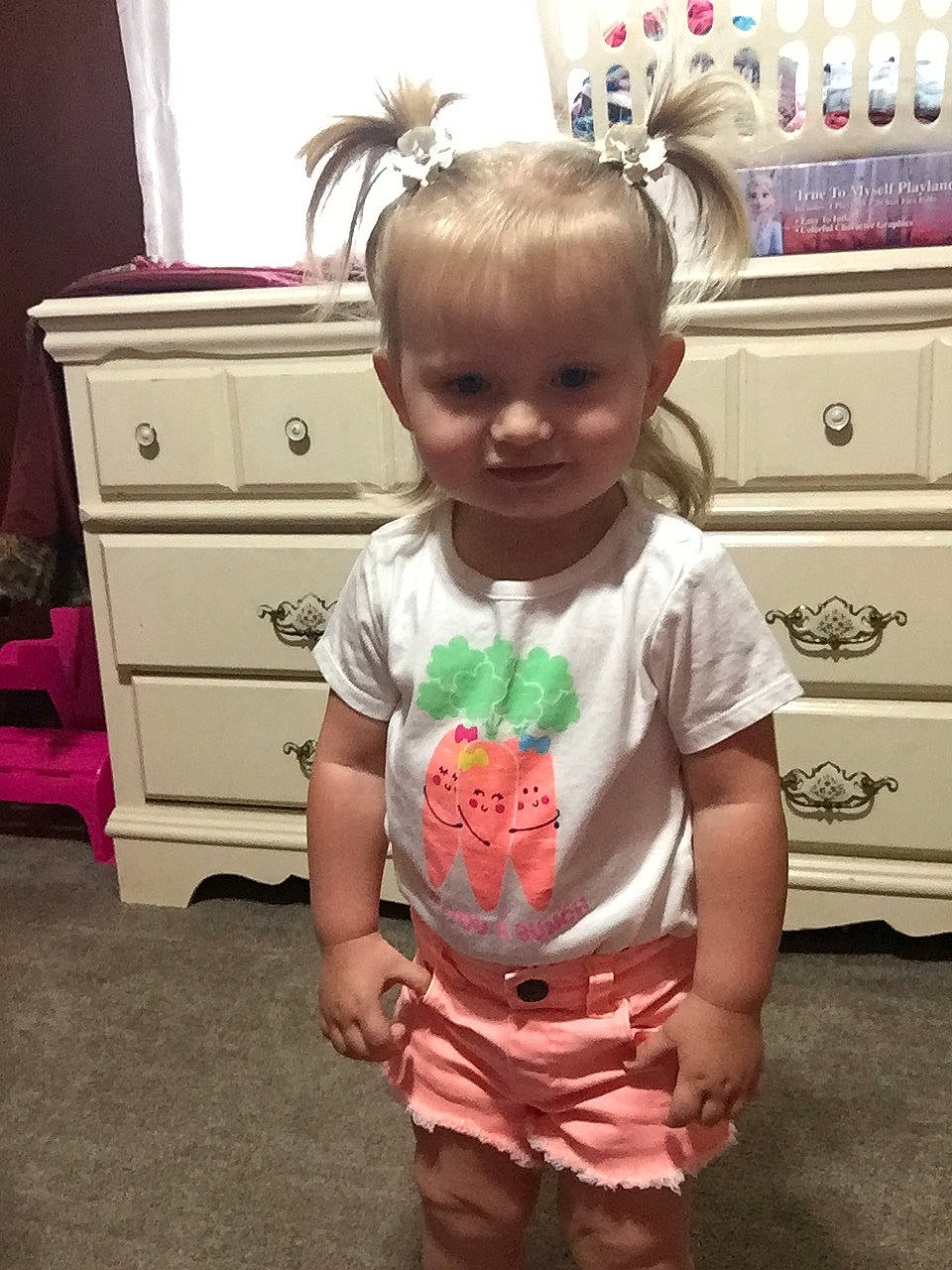 Harlee joined the competition — help win amazing prizes! baby_toddler_clothing, cabinetry, chest, chest_of_drawers, drawer, dresser, floor, flooring, hair, hairstyle, happy, head, person, pink, skin, sleeve, snapshot, standing, toddler, white