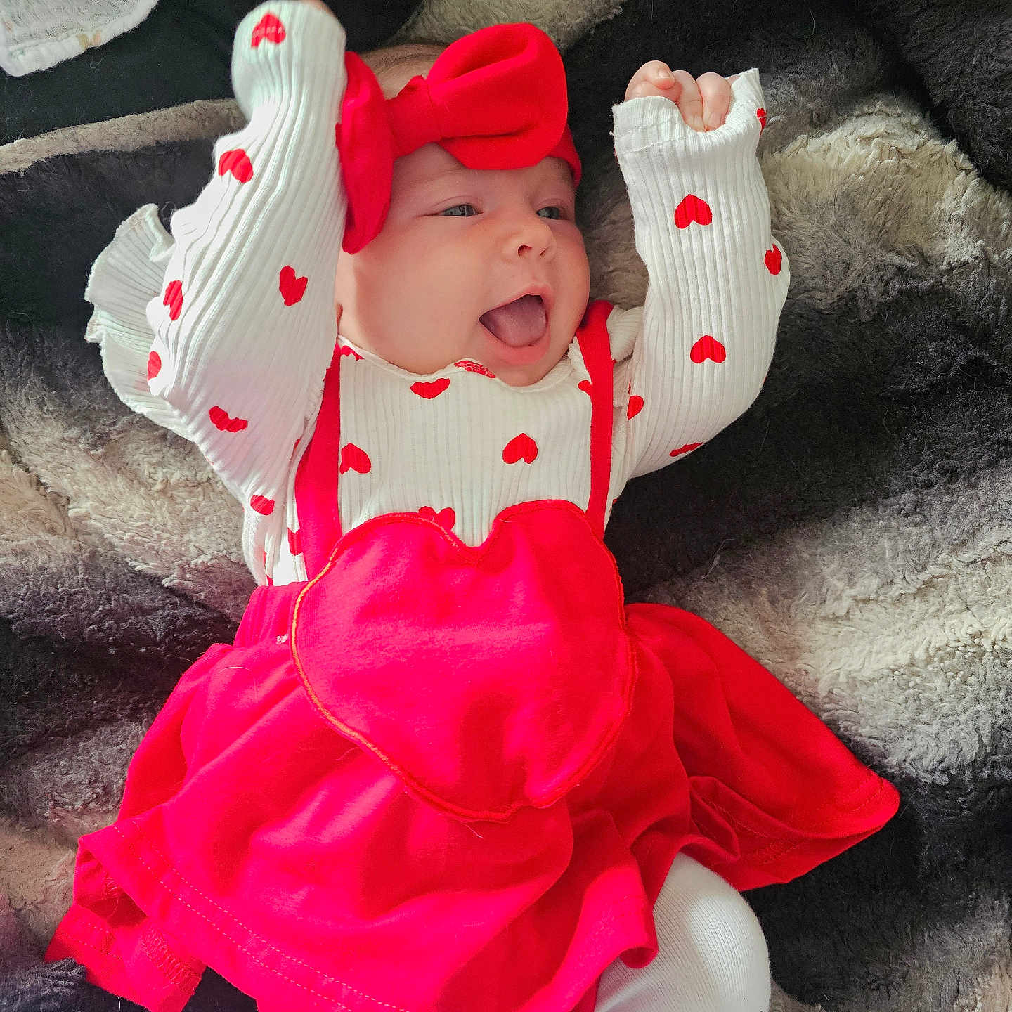 Willow is registered to the contest to win money with this photo: baby, bonnet, cap, clothing, coat, costume, dress, face, glove, happy, hat, head, hood, hosiery, jacket, newborn, person, photography, portrait, sock