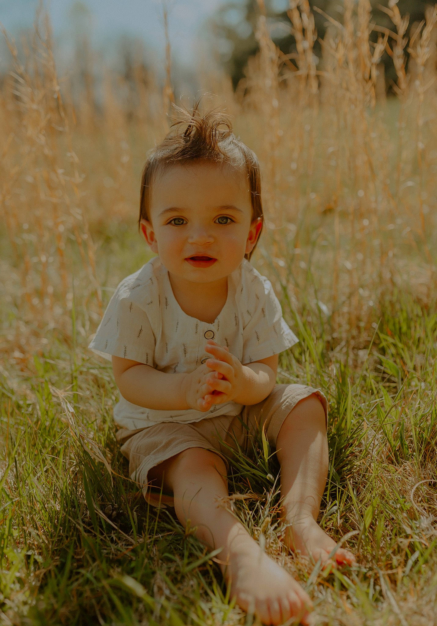 Camdyn joined the competition — help win amazing prizes! baby, baby_toddler_clothing, child, eye, fun, grass, grass_family, grassland, happy, human_body, landscape, meadow, people_in_nature, person, plant, prairie, sitting, skin, smile, sunlight